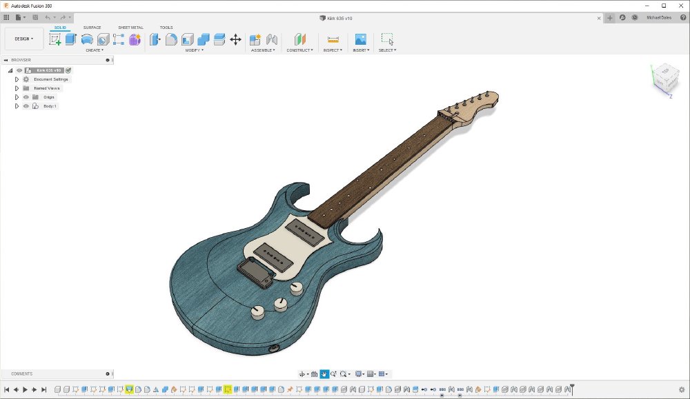 The CAD model of a guitar. It is a solid body electric guitar design, with an arched top, and two pointy curved upper horns to provide access to the higher frets. There is a small pickguard in the middle that houses two P90 pickups, and there are three control knobs.
