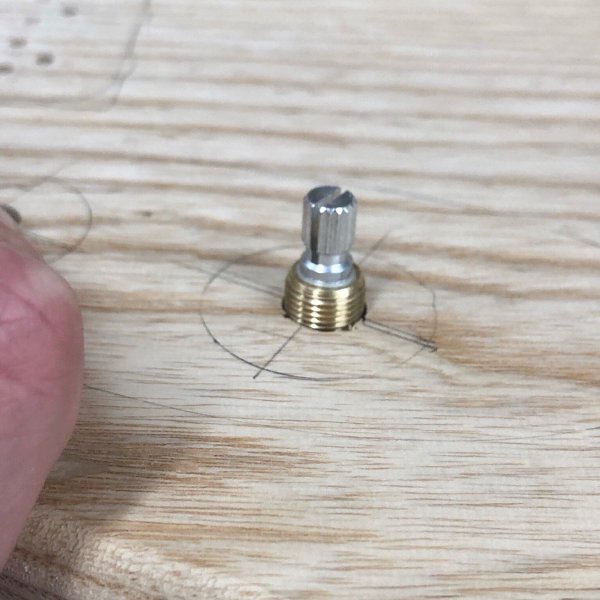 A repeat of the last picture, only now the switch is poking through more, and you can see the screw thread that'll have a nut on it to mount it properly.