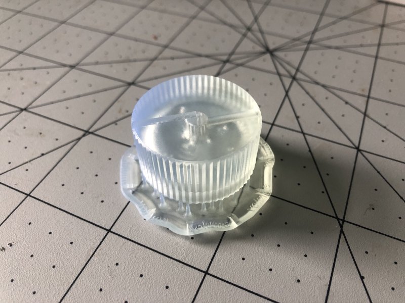 The finished clear resin print, including all the supports and base added by the 3D printer software.