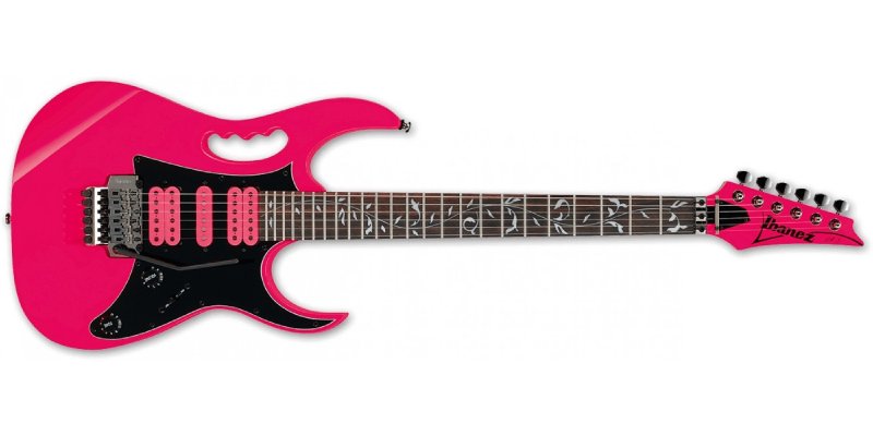 A hot pink super-strat style guitar that is most visually notable because it has a carry-handle built into the body.