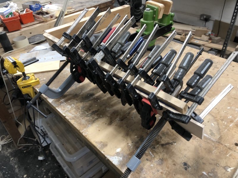 You can just about see the neck and it's jig in amongst a mess of two dozen of so G-clamps.