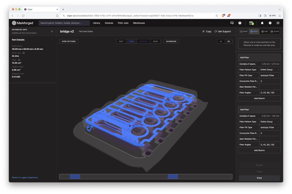 A screen shot of the Markforged software with my combined single bridge plate model showing. The model is ghosted, and showing where the carbon-fibre is printed inside, and that layer has lots of large gaps in it.
