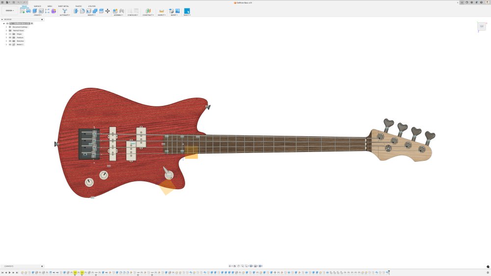 A screenshot of a bass-guitar in a CAD tool, showing a view looking straight-on to the front face. The shape is similar to the guitar photoed on the workbench above, but the horns around the neck area are much more pronounced.