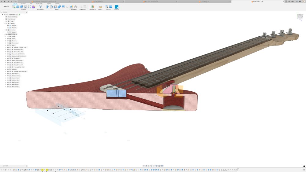 A screenshot of a sectional analysis in the CAD software, showing a cut through the body where there is a tunnel joining the neck pickup cavity to the pickup selector switch cavity. The tunnel connects the two, but where it joins the selector cavity there is very little gap between that point and the bottom of the body, so a little more and it'd miss coming out in the cavity and exit into the back of the guitar.